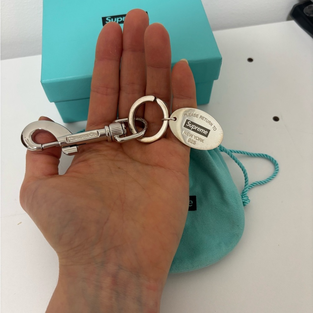 Supreme Silver Engraved Keychain with Teal Pouch